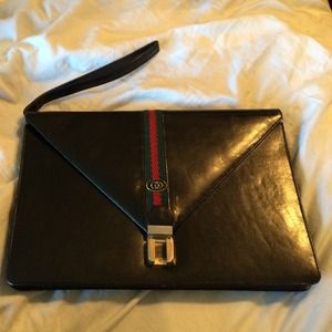 Authentic Gucci large clutch with strap.