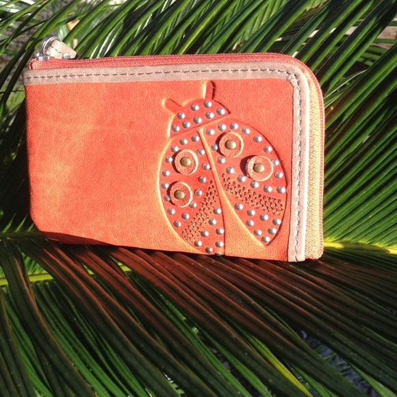 Fossil zip coin/keychain