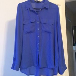 Sheer "electric" blue blouse.