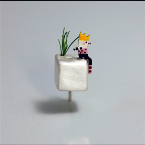 Prince brooch