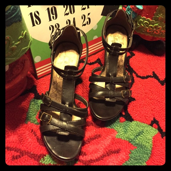 Brown dress shoes with buckle closer