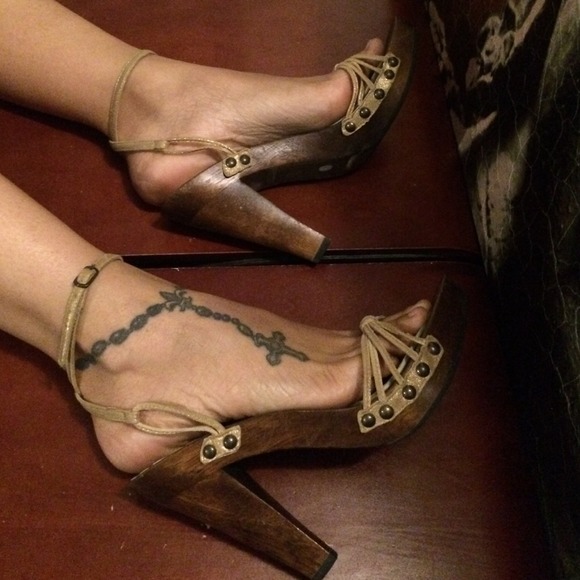Gold heels with a wood platform