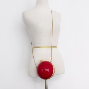 Red ball clutch purse