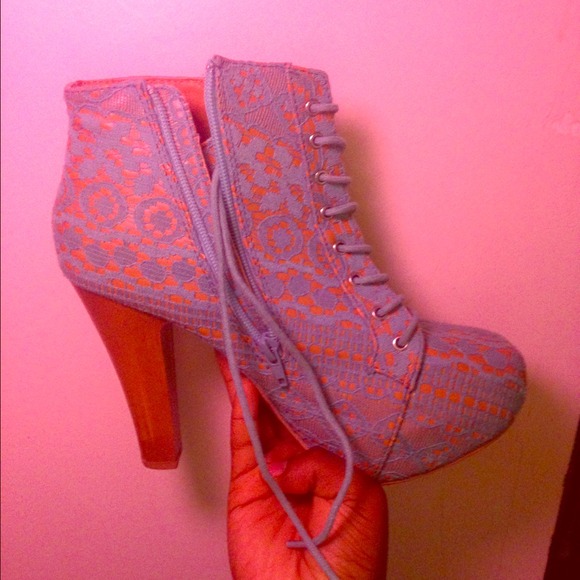 Teal colored laced boots