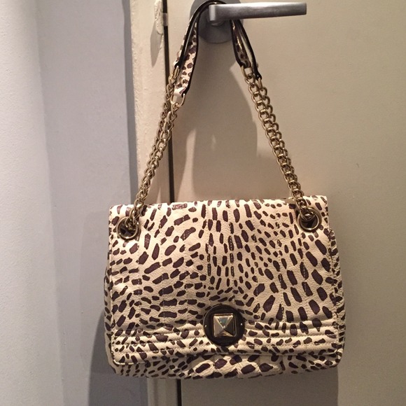 kate spade Handbags - Kate Spade Evangeline Leather Safari Purse