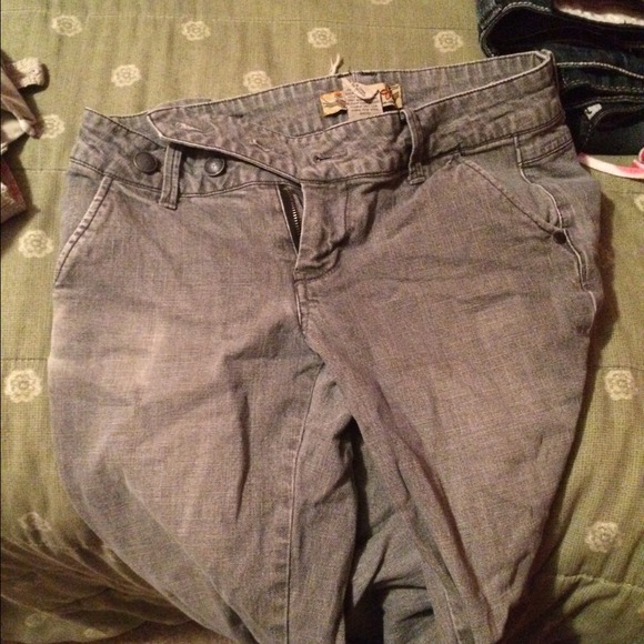 Grey boot cut pants.