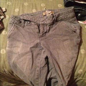 Grey boot cut pants.