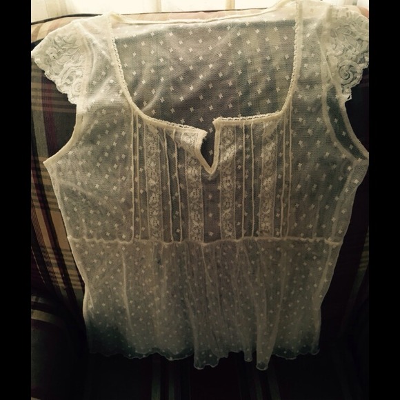 Sweet open work top.  Great paired with your tank.