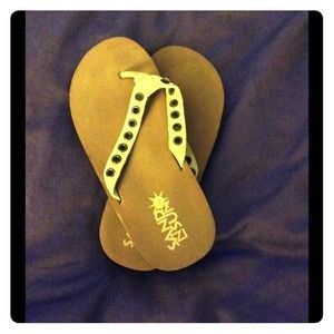 Tan flip flops **Or FREE with purchase** Just ask