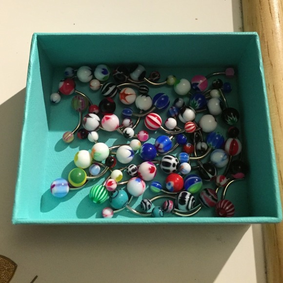 Lot of 45 belly button piercings