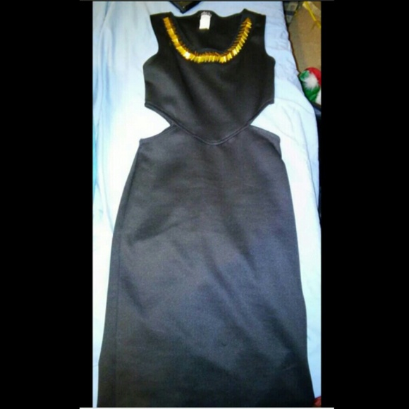 Black dress with slits in sides.
