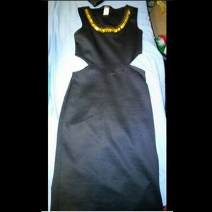 Black dress with slits in sides.