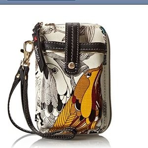 Sakroots handle wallet with a phone holder