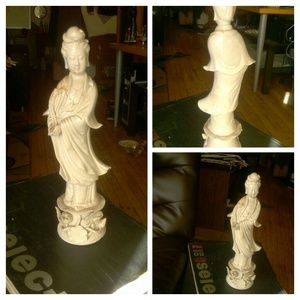 Asian lady on flowers statue