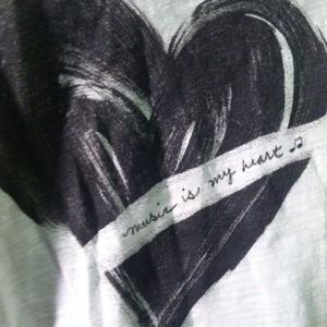 Asrospostale white tee "Music is my heart" quote.