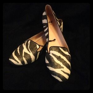 Animal print flats with gold accents