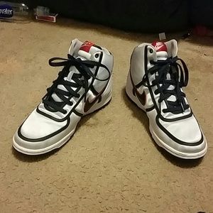 Silver and red Nike shoes