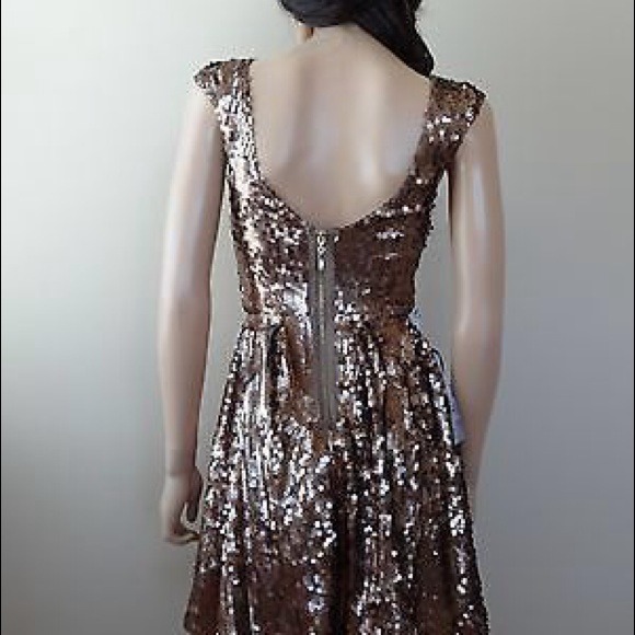 Gold Bebe sequin dress. Size small. NWT. New Years - Picture 2 of 4