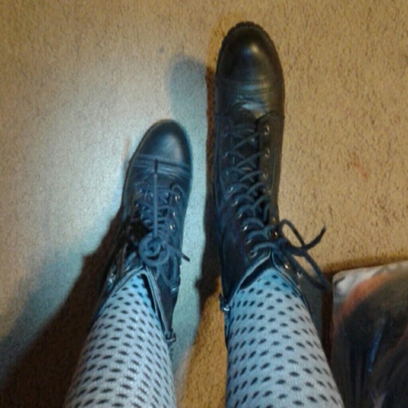 Black combat boots with zipper and shoes laces