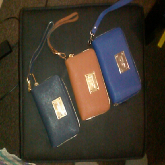 SOLD ...Michael kors wallet /phone holder wristlet