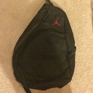 Black back pack with Jordan in red