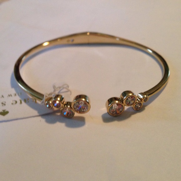 Kate Spade gold hinged bracelet