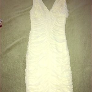 Bebe white dress. Wore once. Its very flaterring