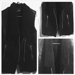 Faux Leather Vest with Zipper Detail.