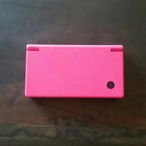 Nintendo DSi with 8 games a charger and a case