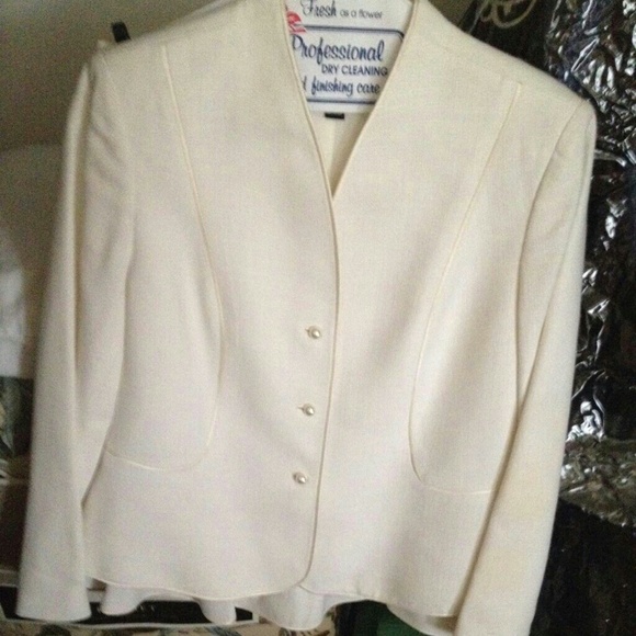 White suit with skirt