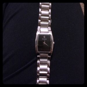 Faux Movado silver watch