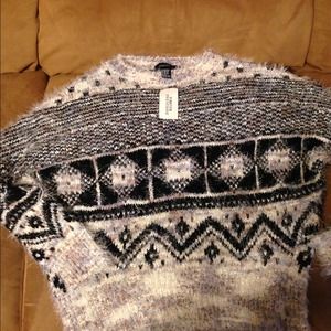 Black and cream sweater.