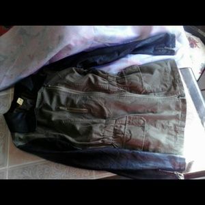 Green with black leather jacket