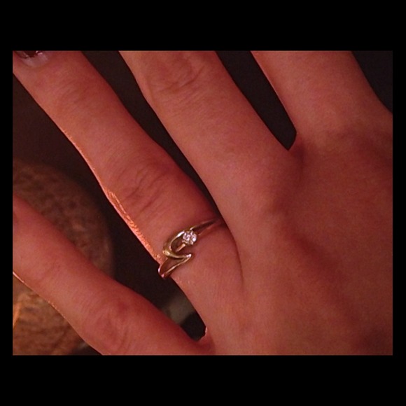 Gold ring with a tiny rhinestone