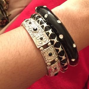 Three piece silver and black bracelet set