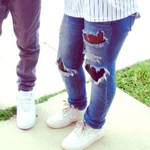 Shredded jeans.Vintage different fabric in areas