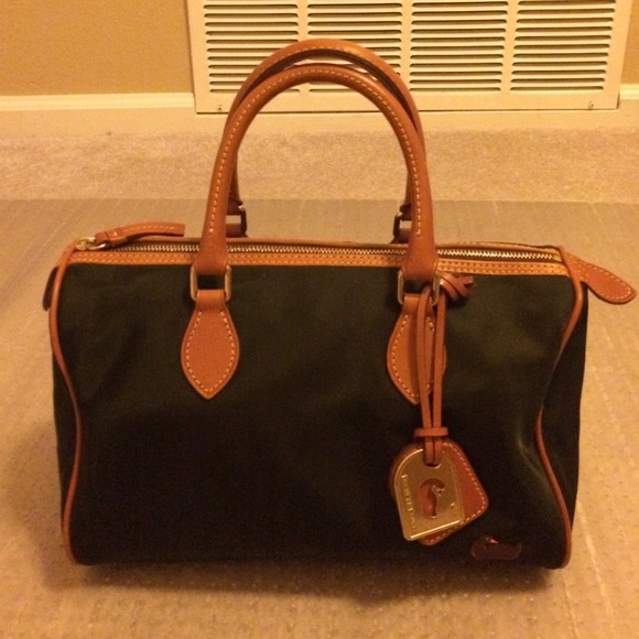 Authentic Dooney And Burke. Additional photos.