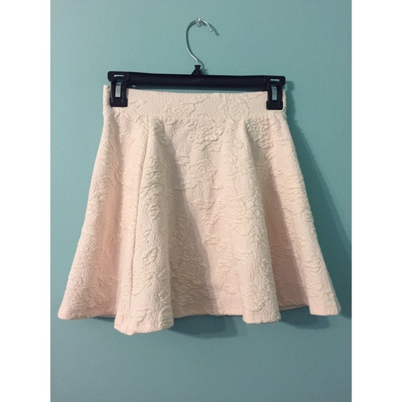 Textured pink skater skirt.