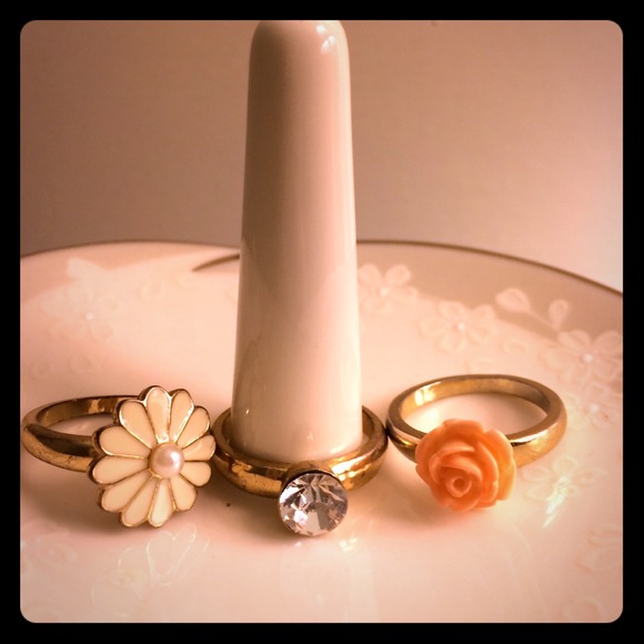 Three elegant gold rings.