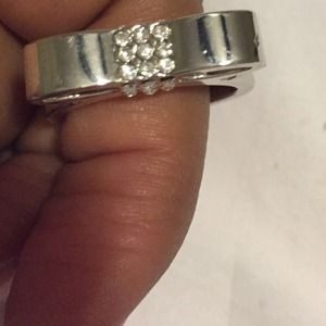 Silver and faux diamond bow ring
