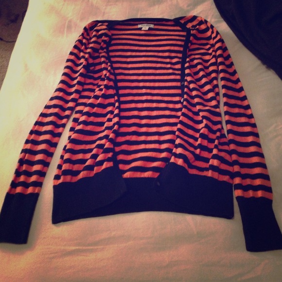 Orange and navy blue stripped cardigan.