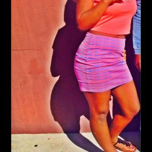 Tight fitting Aztec print short skirt