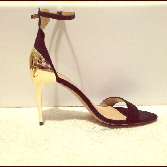 Black Zara stiletto sandal with gold heel