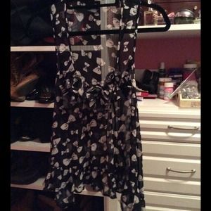 Never worn cute semi sheer bow high low tank!