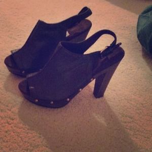 Never worn buckle in the back high heels!