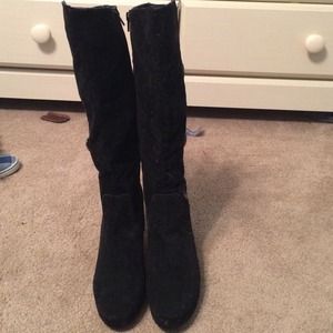 Tall black wedge boots