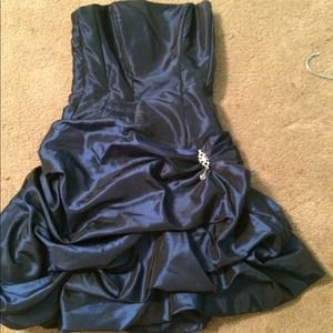 Navy blue ruffled dress.