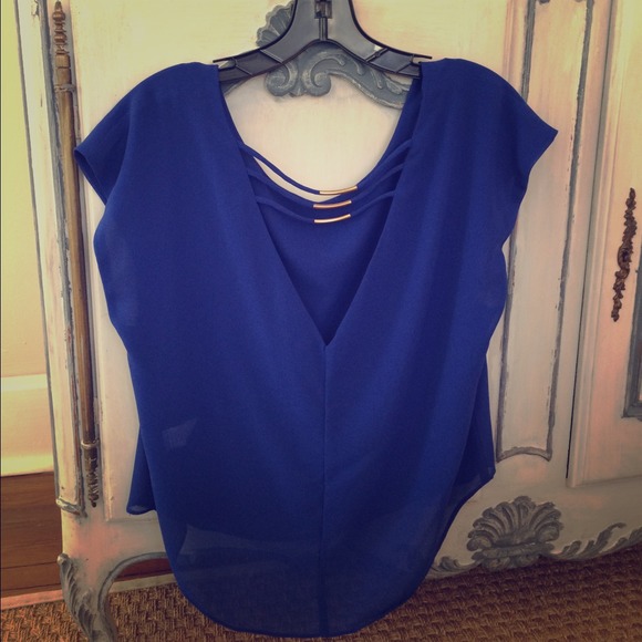 Cobalt blue top with back detail. Size S
