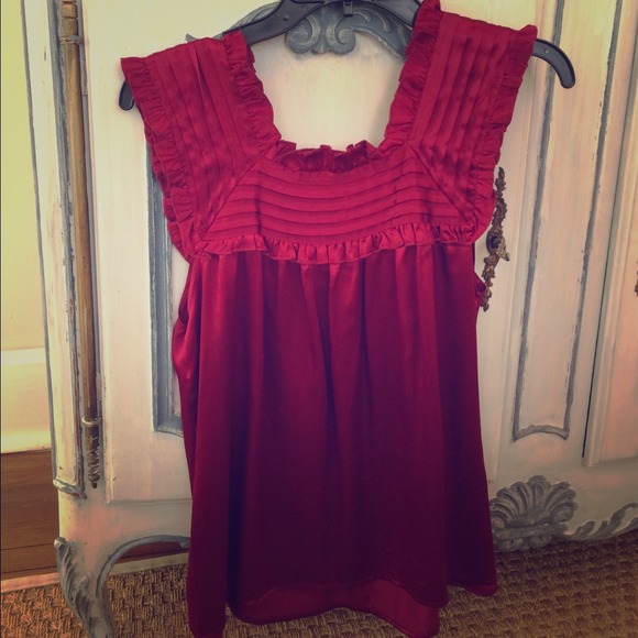 Silk wine red top with ruffle detail. Size M
