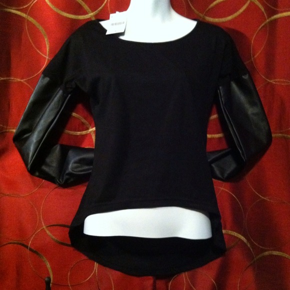 Faux leather sleeve high low top